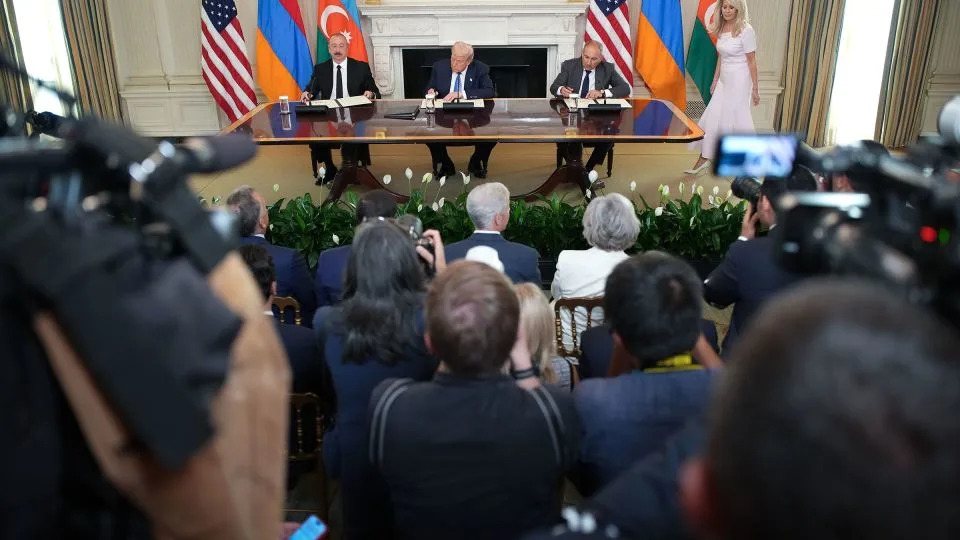 Azerbaijani President Ilham Aliyev, left, Armenian Prime Minister Nikol Pashinyan and Trump sign a peace agreement during a ceremony at the White House on August 8. - Andrew Harnik/Getty Images/File