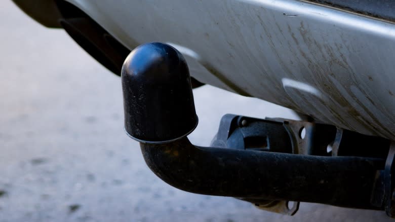 A tow hitch ball with a cover