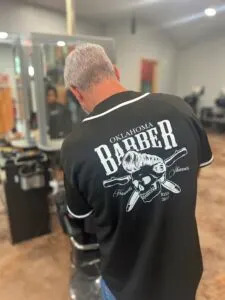 Eric Cotter, a participant in the R.I.S.E. program, cuts hair on Monday, July 28, 2025. (Photo by Lance West/Courtesy Oklahoma Department of Corrections)