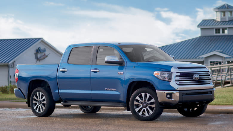 2018 Toyota Tundra Limited on side of road with buildings in the background