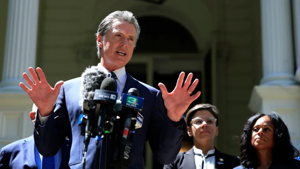 California Gov. Gavin Newsom speaks during a news conference with Texas lawmakers at the Governor’s Mansion on July 25 in Sacramento. - Justin Sullivan/Getty Images