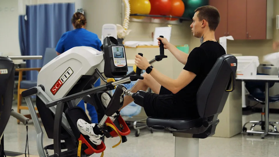 Yurii Saiko, a former Ukrainian marine, undergoes rehab after receiving a prosthetic leg at the Staten Island University Hospital in New York.