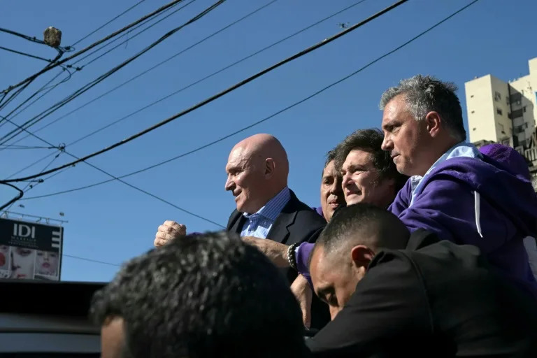 Argentina's Milei pelted with stones on campaign trail