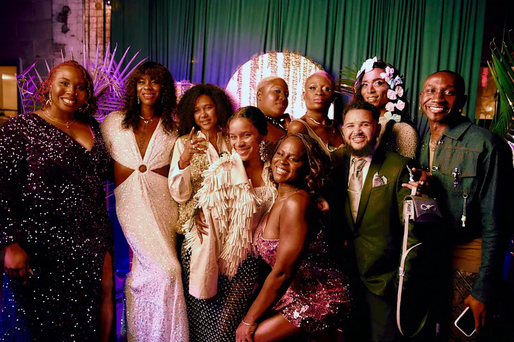 <span>Devin Michael Lowe (right), the founder and co-director of Black Trans Travel Fund (BTTF) and attendees at BTTF’s gala on 7 November, 2024.</span><span>Photograph: Lexi Webster</span>
