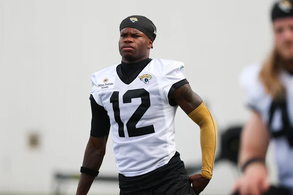 JACKSONVILLE, FLORIDA - JULY 25: Travis Hunter #12 of the Jacksonville Jaguars warms up during Training Camp at Miller Electric Center on July 25, 2025 in Jacksonville, Florida. (Photo by Logan Bowles/Getty Images)