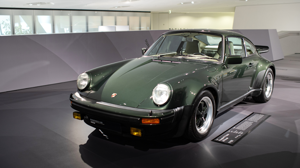 Stuttgart, Germany. Porsche Museum.. 1976 Type 930 Porsche 911 turbo 3.0 coupe in green