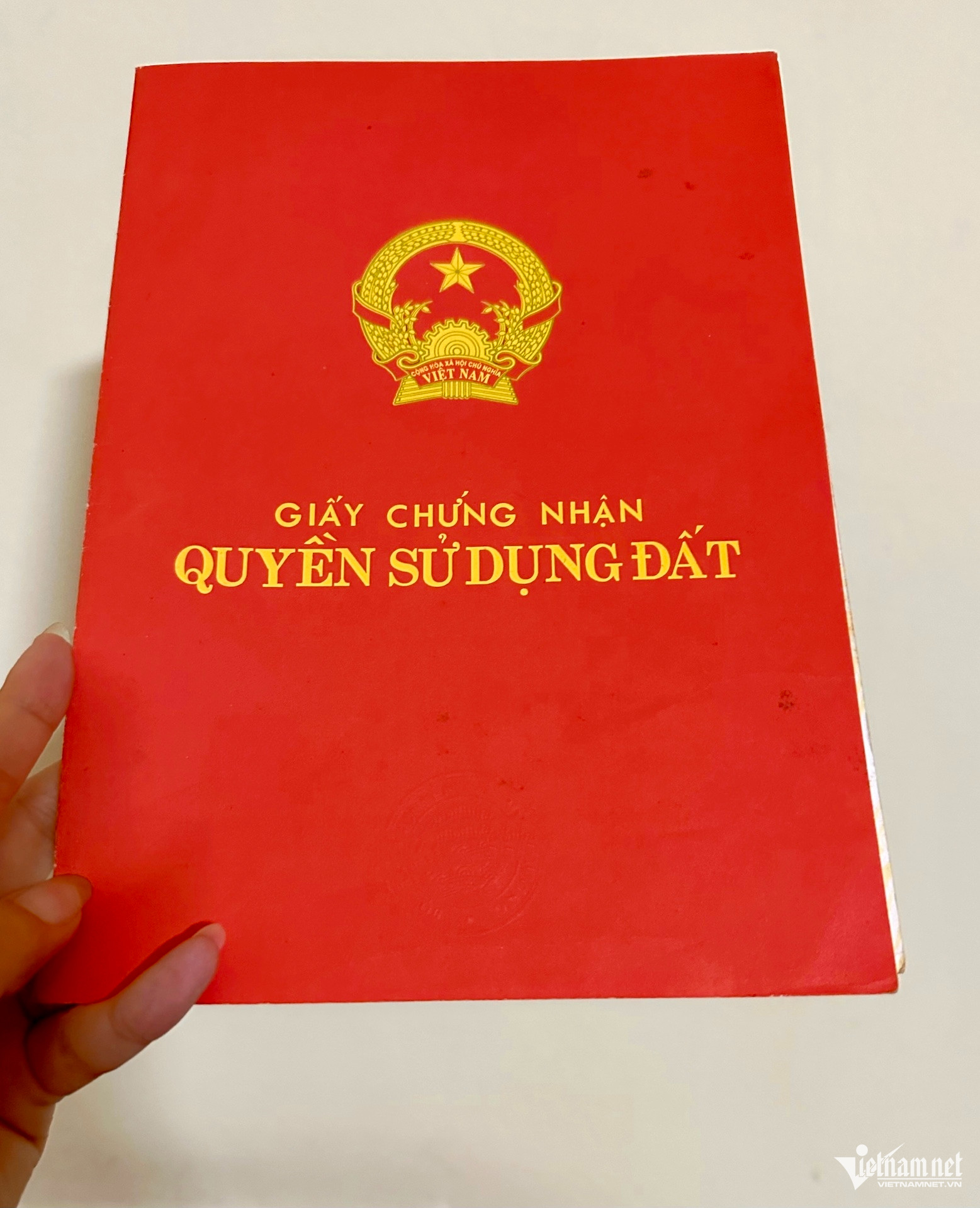 Sổ đỏ đã ký nhưng 20 năm chưa nhận, Bộ trả lời thế nào?