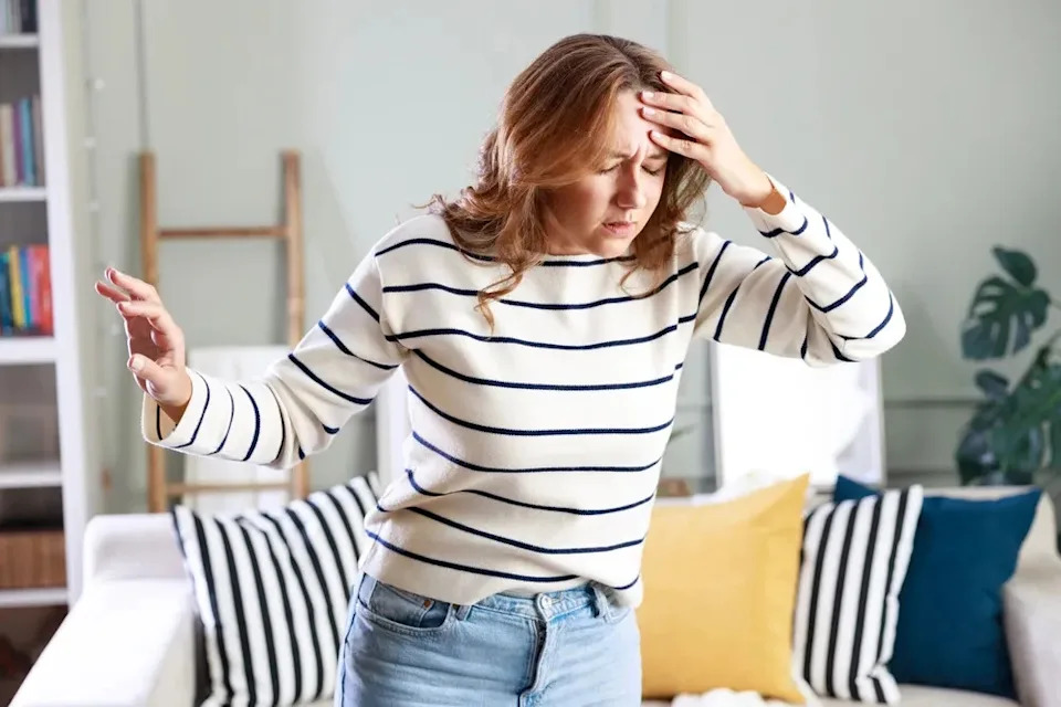 Young woman suffering from emotions.