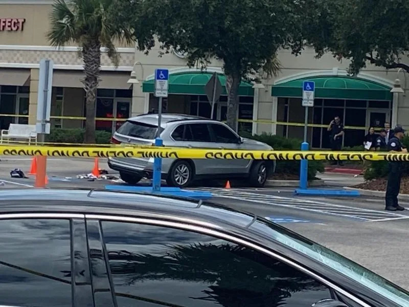 Florida police officer shoots driver in Publix parking lot amid search for stolen vehicle