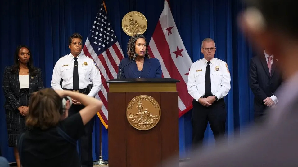 Washington, DC Mayor Muriel Bowser, center, is joined by Chief of Police at the Metropolitan Police Department Pamela Smith, left, Fire and Emergency Medical Services Chief Chief John Donnelly and other members of her administration, at a press conference on Monday. - Kevin Dietsch/Getty Images