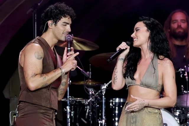 Kevin Mazur/Getty  Joe Jonas and Demi Lovato