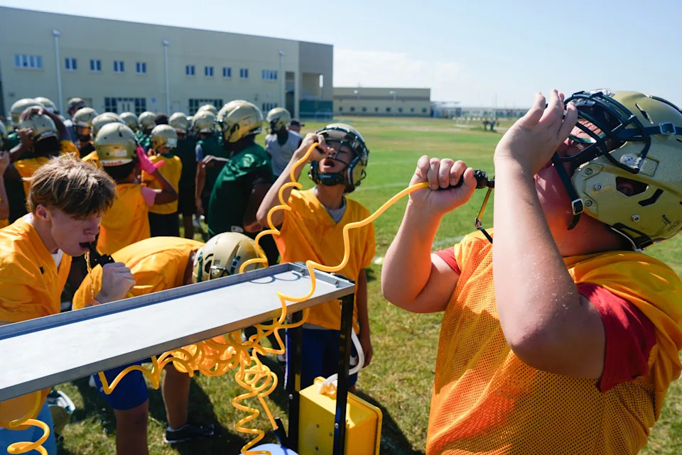 Viera football players take a water break between drills in preparation for the upcoming season July 28, 2025. Craig Bailey/FLORIDA TODAY via USA TODAY NETWORK