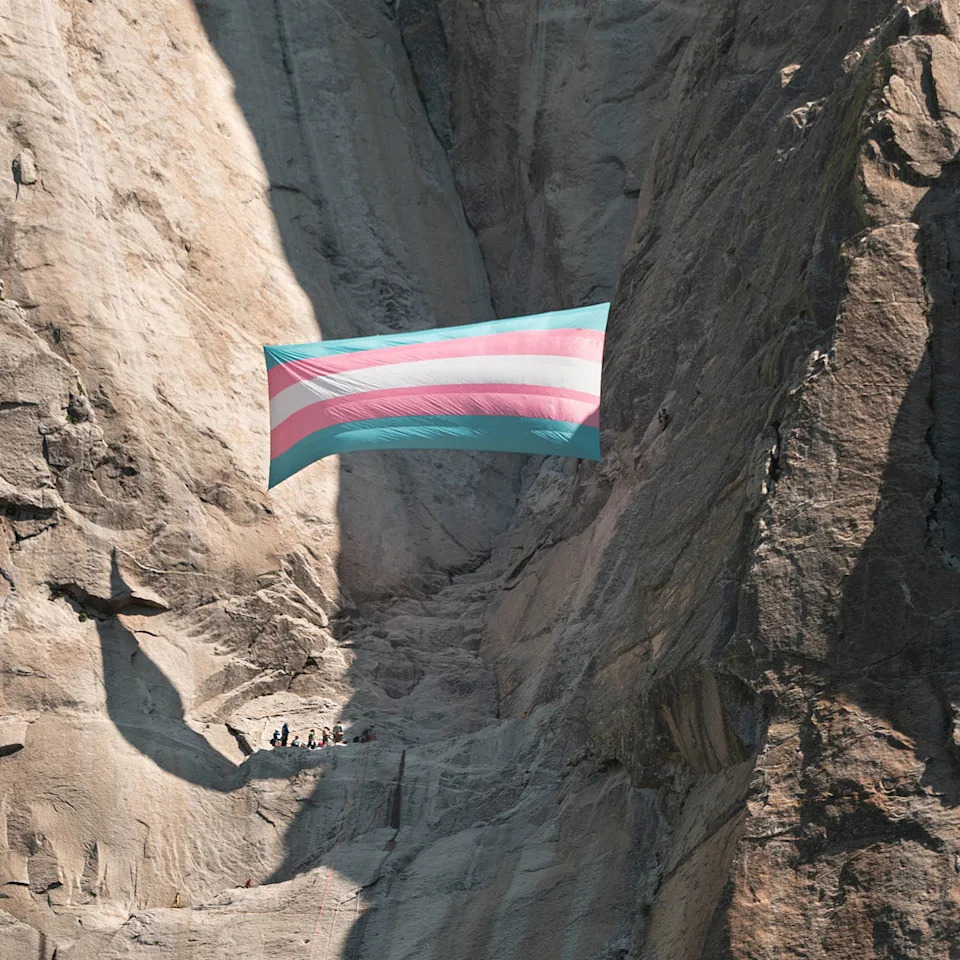 A transgender flag hangs on the face of Yosemite National Park's iconic El Capitan rock formation in May 2025. (Jayce Kolinski)