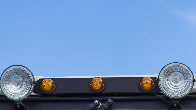Floodlights mounted on a vehicle