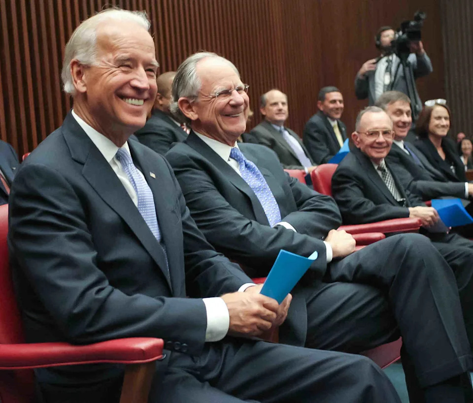 Vice President Joe Biden and Congressman Mike Castle laugh at remarks during the swearing-in ceremony of Leonard P. Stark as a federal judge on Oct. 15, 2010.