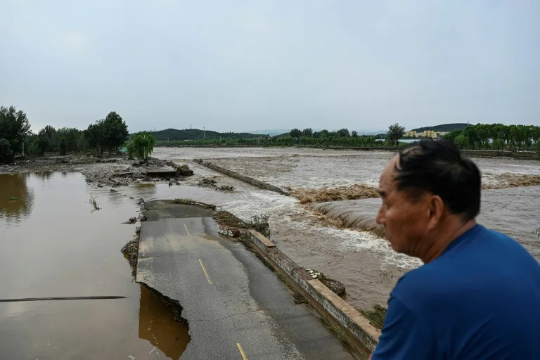 Intense rainstorms have pummelled swathes of northern China this week, including the capital and the provinces of Hebei, Jilin and Shandong (Jade GAO)