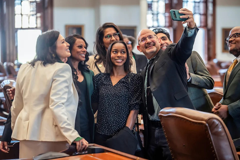 Sergio Flores/Reuters - PHOTO: Texas Democratic lawmakers take a selfie together ahead of a House meeting in the State Capitol, August 20, 2025 in Austin, Texas.