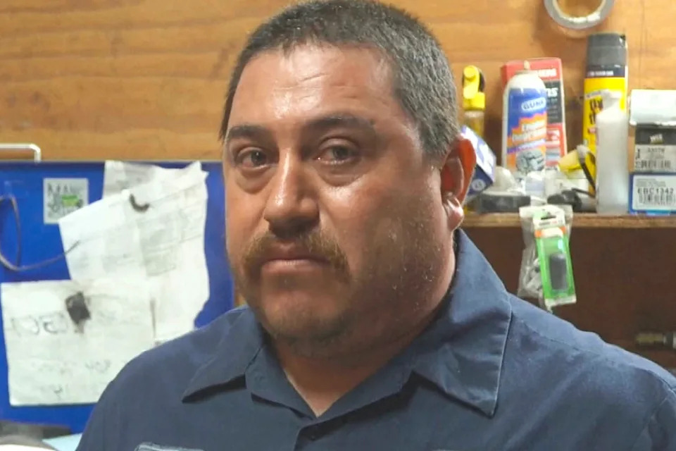 Enrique Garfias, owner of Monkeys Garage, said what Dietrich is doing with the sign "is not right." (WITN)