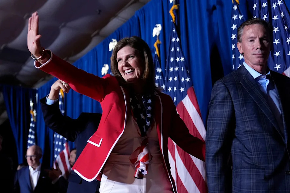 South Carolina Lt. Gov. Pamela Evette and her husband David walk from the stage at a primary election night party in Columbia on Feb. 24, 2024. (Andrew Harnik / AP file)